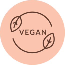 VEGAN badge with peach circular background, brown interrupted circular line and two stylized leaves